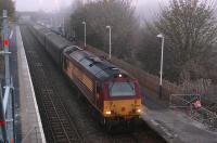 The morning Cardenden - Edinburgh commuter service arrives at a ch..ch.. chilly Rosyth behind 67030 on 25 November. Photographed from the temporary footbridge provided while station improvements are underway.<br><br>[Bill Roberton 25/11/2013]