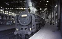 70035 <I>Rudyard Kipling</I> awaits its departure time at Glasgow Central on 15 July 1966 with a train for Liverpool/Manchester. <br><br>[John Robin 15/07/1966]