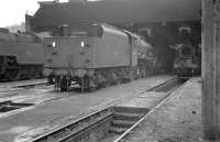 Locomotives on shed at Bangor on 1 April 1963, with Jubilee 4-6-0 45672 <I>Anson</I> in the centre of the picture.<br><br>[K A Gray 01/04/1963]