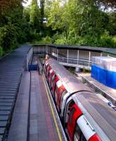 Provision of wheelchair access to the Northern Line station at High Barnet is via this covered walkway [see image 44090]. View looks North on 12 July 2013.<br><br>[Ken Strachan 12/07/2013]