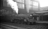 A relief summer Saturday working from Heads of Ayr to Leeds City prepares to leave Carlisle for the south on 1 August 1964 behind Holbeck Jubilee 45697 <I>Achilles</I>. <br><br>[K A Gray //]