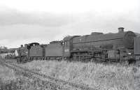 Steam locomotives stored in Lugton sidings on 26 June 1962 included Jubilee 45711 <I>Courageous</I> and class 2P 40621.<br><br>[John Robin 26/06/1962]