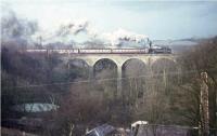 A Standard class 4 2-6-4T crosses Busby Viaduct in April 1965 with a train for East Kilbride.<br><br>[G W Robin /04/1965]