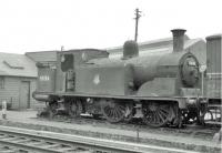 McIntosh ex-Caledonian 0-4-4T no 55124 in a siding alongside Dalry Road shed in May 1963. Built at St Rollox in 1895, the locomotive had been withdrawn in September 1961 and was stored awaiting disposal. That finally took place in the yard of Messrs Arnott Young, Troon, some four months after this photograph was taken.<br><br>[John Robin 31/05/1963]