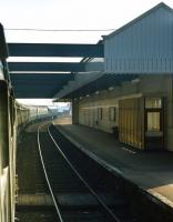 An up ECML service at Dunbar at 12:15 on September 12th 1971. The locomotive is class 46 <I>Peak</I> No. 148 and the train is the 11:40 Waverley to Kings Cross relief. It was rather a slow journey to Berwick, with slowings for engineering works necessary at various points, including wrong line working between Craigentinny and Joppa. <br><br>[Bill Jamieson 12/09/1971]