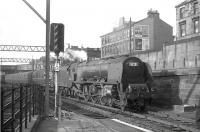 46249 <I>City of Sheffield</I> runs south through Eglinton Street, early in the evening of 13 July 1962, shortly after leaving Glasgow Central with the 7.20pm to London Euston. <br><br>[John Robin 13/07/1962]