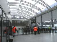 Looking towards the automatic ticket gates over the new concourse at Haymarket on 19 December 2013.<br><br>[John Yellowlees 19/12/2013]
