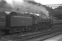 BR <I>Clan</I> light Pacific no 72002 <I>Clan Campbell</I> runs into Glasgow Central on 23 June 1962 with the 9.20am from Lockerbie. The locomotive would be withdrawn from Polmadie shed by the end of that year.<br><br>[John Robin 23/06/1962]