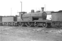 Drummond <I>Small Ben</I> 4-4-0 no 54398 <I>Ben Alder</I> in sidings alongside Balornock Shed around 1961. Withdrawn from operational service in 1953, the former HR locomotive, built by Dubs & Co in 1898, was stored in a number of locations, pending possible preservation, before finally being cut up at MMS Wishaw in May 1966. <br><br>[David Stewart //1961]