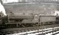 Scott class 4-4-0 no 62422 <I>Caleb Balderstone</I> in the shed yard at Hawick in 1958, its final year of operation.<br><br>[K A Gray //1958]