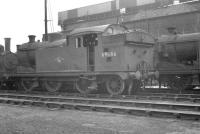 Class N7 0-6-2T no 69686 standing alongside the coal monster at Stratford [see image 32083] in September 1961, the month of its withdrawal. <br><br>[K A Gray 09/10/1961]