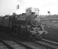 Black 5 no 45278 brings a down train past the ex-LMS shed (6A) on the southern approach to Chester station in April 1962. [Ref query 5818]<br><br>[K A Gray 14/04/1962]