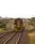 A southbound Cambrian Coast Line service approaching Tywyn station on a summer evening in August 2011, ultimate destination Birmingham International.<br><br>[Ian Dinmore 17/08/2011]