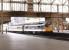 With a full set in BR InterCity livery, 86212 <I>Preston Guild</I> runs into Carlisle station on a fine afternoon in August 1997 at the head of an up  WCML service.<br><br>[John Furnevel 19/08/1997]