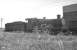 Collett 0-6-0 no 2239 stands alongside Aberystwyth shed on 13 August 1962. The locomotive had been withdrawn from Machynlleth some 3 months earlier.<br><br>[K A Gray 13/08/1962]