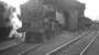 Beattock banker. BR Standard class 4 2-6-4T 80002 stands outside the shed in late 1963. Stored in the siding behind the shed on the right is veteran McIntosh 3F 0-6-0 no 57568. [See image 20292]<br><br>[K A Gray //1963]