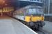 Until re-opening of stations on the Maryhill line, platform 1 at Queen Street was a bit of a purposeless backwater. Here it plays host to a class 47/7 and a 37 in January of 1989.<br><br>[Ewan Crawford /01/1989]