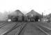 A visit to Dumfries on 26 August 1960. View north over the shed yard with the G&SW main line running past on the left. Locomotives on shed that day included Black 5s, 2P 4-4-0s and ex-Caledonian 0-6-0s. Dumfries shed finally closed in May 1966. [See image 3570] <br><br>[David Stewart 26/08/1960]