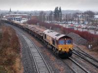 DBS 66197 hauls an engineers train from Millerhill to Thornton Junction (for Ladybank) through Kirkcaldy on 18 January.<br><br>[Bill Roberton 18/01/2013]
