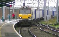 DBS 92002 moves 4S43 Daventry to Mossend Tesco Containers through platform 1 at Carlisle on 17 October.<br><br>[Ken Browne 17/10/2013]