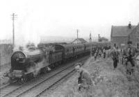 NBR 256 <i>Glen Douglas</i> makes a photostop at the closed Madderty station on 23 April 1962. The locomotive was on its way from Methven Junction to Crieff with the BLS / SLS <i>Scottish Rambler</i>. [Ref Query 12798] [See image 11597]<br><br>[David Stewart 23/04/1962]