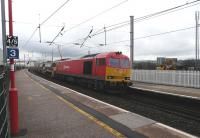 DB Schenker class 60 No.60020 arrives at Penrith on 4 January with an engineers train from Crewe Basford Hall.<br><br>[Ken Browne 04/01/2014]