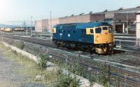 The west end of Gateshead motive power depot on 26 May 1982 looking towards King Edward Bridge Junction. Locomotive 26029 runs past in the foreground.<br><br>[Colin Alexander 26/05/1982]