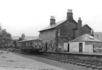 Park Royal railbus SC79974 stands at the buffer stops at Dalmellington station on 5 September 1961 with a service for Ayr.<br><br>[David Stewart 05/09/1961]