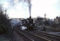 An East Kilbride train calls at Giffnock in April 1966. Locomotive is Corkerhill Standard class 4 tank 80046, complete with Caledonian semaphore route indicator.<br><br>[G W Robin /04/1966]