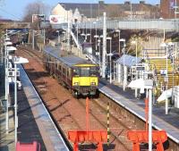 The 11.01 ex-Dalmuir arrives at Larkhall terminus on 30 January 2014 formed by unit 318260. <br><br>[John Furnevel 30/01/2014]