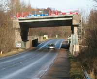 The recently constructed Borders Railway bridge spanning the A7 at Gore Glen. Photographed on Saturday morning 8 February 2014, looking north towards Newtongrange.<br><br>[John Furnevel 08/02/2014]