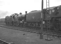 Culture clash at Derby Works on 27 August 1960. Preserved Midland Compound 4-4-0 no 1000 of 1902 buffers up to BR Standard class 9F 2-10-0 no 92139 of 1957.<br><br>[K A Gray 27/08/1960]