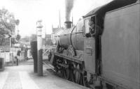 A pleasant August afternoon at Gobowen station in 1960, with Worcester based Modified Hall 4-6-0 no 6984 <I>Owsden Hall</I> at the platform awaiting departure with a northbound train towards Wrexham.  <br><br>[David Stewart /08/1960]