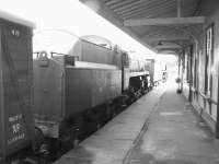 BR 9F 2-10-0 no 92240 (leading) and BR 4MT 4-6-0 no 75027 alongside the platform at Horsted Keynes 12 April 2012. [See image 39048]<br><br>[Colin Alexander 12/04/2012]