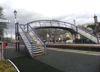 Platform scene at Pitlochry on 25 February, with traditional lanterns completing the improvements to the footbridge.<br><br>[John Yellowlees 25/02/2014]