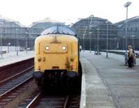 Deltic 55013 <I>The Black Watch</I> prepares to leave Hull with a London Kings Cross train in the summer of 1980. Note the major work in progress on the station roof.<br><br>[Colin Alexander 11/08/1980]