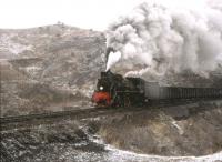 The Chengde branch line north of Beijing feeds coal to a local steel mill. The train is in the process of climbing a five mile 1:75 gradient. [See image 32581]<br><br>[Peter Todd 09/04/2000]