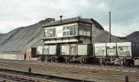 The signal box to the north of Kirkconnel station in April 1965, with the rail served Fauldhead Colliery beyond. [See image 40175]<br><br>[John Robin 02/04/1965]