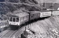 A DMU for Pwllheli comes off Barmouth Viaduct in July 1981.<br><br>[Colin Miller /07/1981]