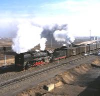 QJ3251 at Da-an Bei, Inner Mongolia, a junction town where class QJ 2-10-2  locomotives appeared regularly on passing freights. Photographed on 17 April 2000.  <br><br>[Peter Todd 17/04/2000]