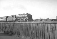 45531 heads south on the WCML past Upperby yards and shed in June 1963. This particular BR boundary fence will be readily recognisable to a number of enthusiasts of a certain age.<br><br>[K A Gray 01/06/1963]