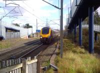 Surrounded by steel: Coventry certainly looks like an industrial city as a Birmingham-bound Voyager passes the location once occupied by the main Triumph car factory.<br><br>[Ken Strachan 21/03/2014]