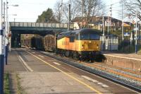 The Carlisle - Chirk loaded log train passes through Leyland on 19 March 2014 with Colas Rail 56094 in charge.<br><br>[John McIntyre 19/03/2014]