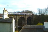 Looking over the rooftops of Knaresborough on 19 March as the 16.45 arrival from Leeds runs out onto the viaduct before crossing over to platform 1 where it will form the 17.05 return service. [See image 23671]<br><br>[Bruce McCartney 19/03/2014]
