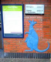 This almost planar sculpture on the booking office wall at Canley depicts a kangaroo and its joey; as you would expect in Coventry.<br><br>[Ken Strachan 21/03/2014]