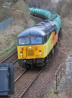 Colas 56087 coasting downhill from the former Touch South Junction, Dunfermline, with the 6N72 Linkswood - Grangemouth empty tanks on 19 March<br><br>[Bill Roberton 19/03/2014]