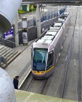 Tram 4006 leaves Dublin Connelly for Saggart on 22 March, seen from the station forecourt.<br><br>[Bill Roberton 22/03/2014]