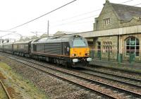 67005 <I>Queen's Messenger</I> heads the Royal Train northwards through Carnforth on 9 April 2014 conveying HRH The Prince of Wales to Oxenholme on a visit to Cumbria. <br><br>[Mark Bartlett 09/04/2014]