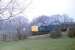A very clean EE Class 40 40073, seen just west of the site of Hoghton station in April 1980, heading for the West Coast Main Line at Farington with a fitted van train.<br><br>[Mark Bartlett 14/04/1980]