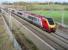 A southbound Voyager approaching the site of the former Blisworth station, Northants, on 4 March 2014 with the 11.30 Birmingham New Street - London Euston.<br><br>[John Steven 04/03/2014]